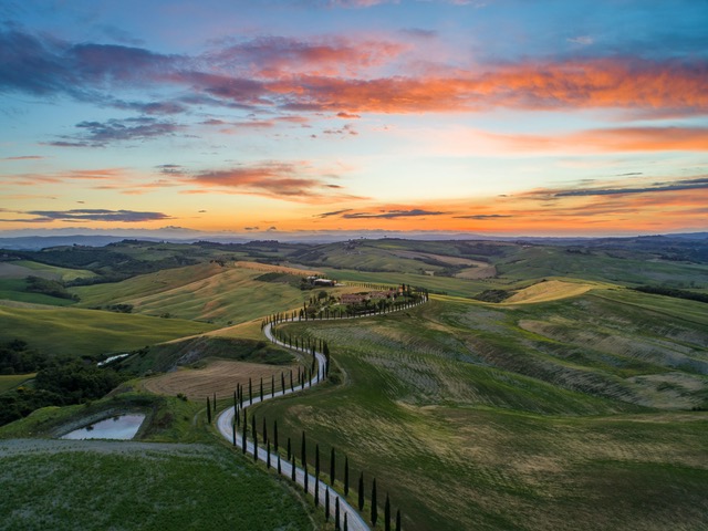 scenic view with sunset in background