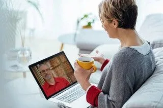 woman using telehealth